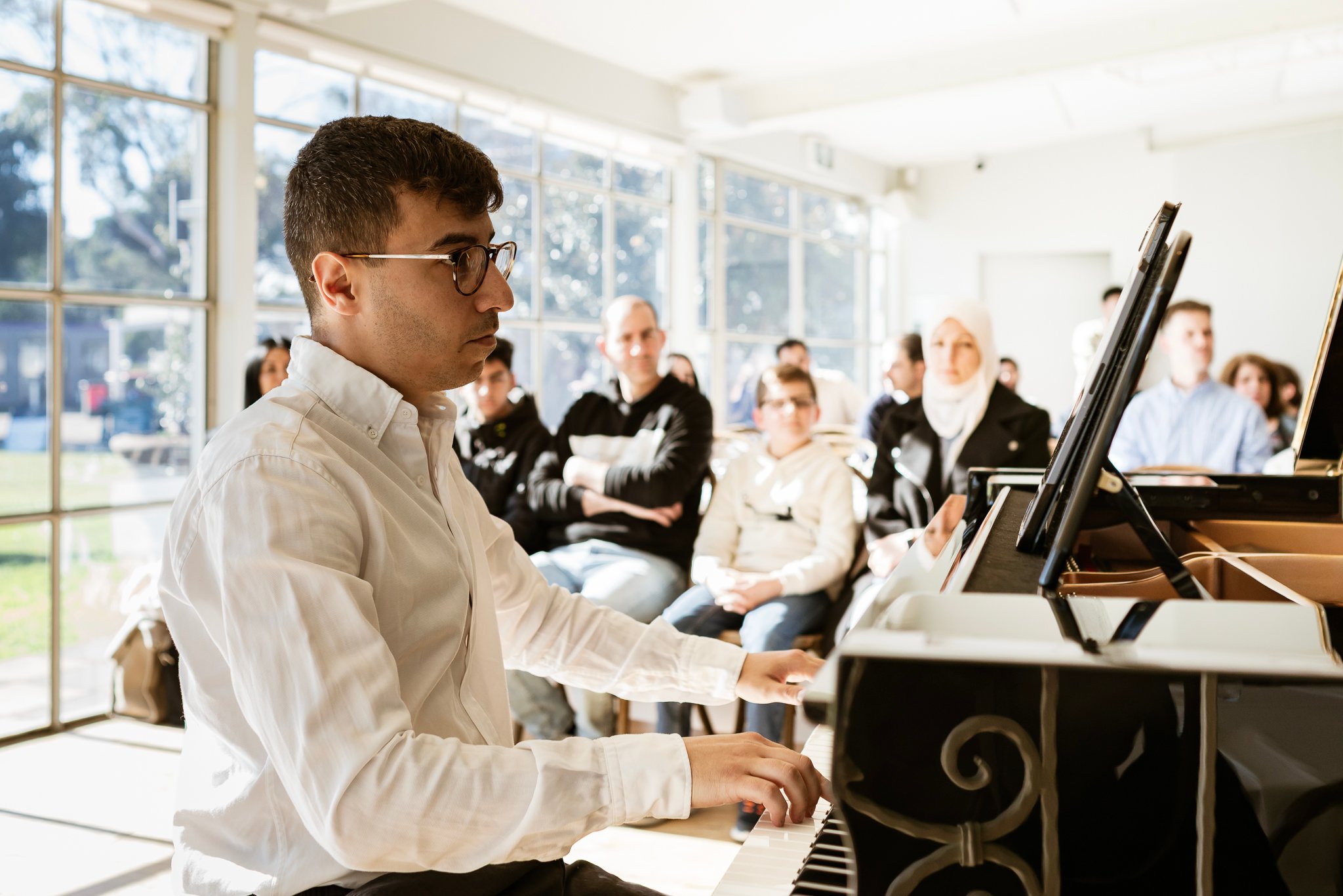 Jayson Gillham and Iyad Sughayer perform for Palestinian families
