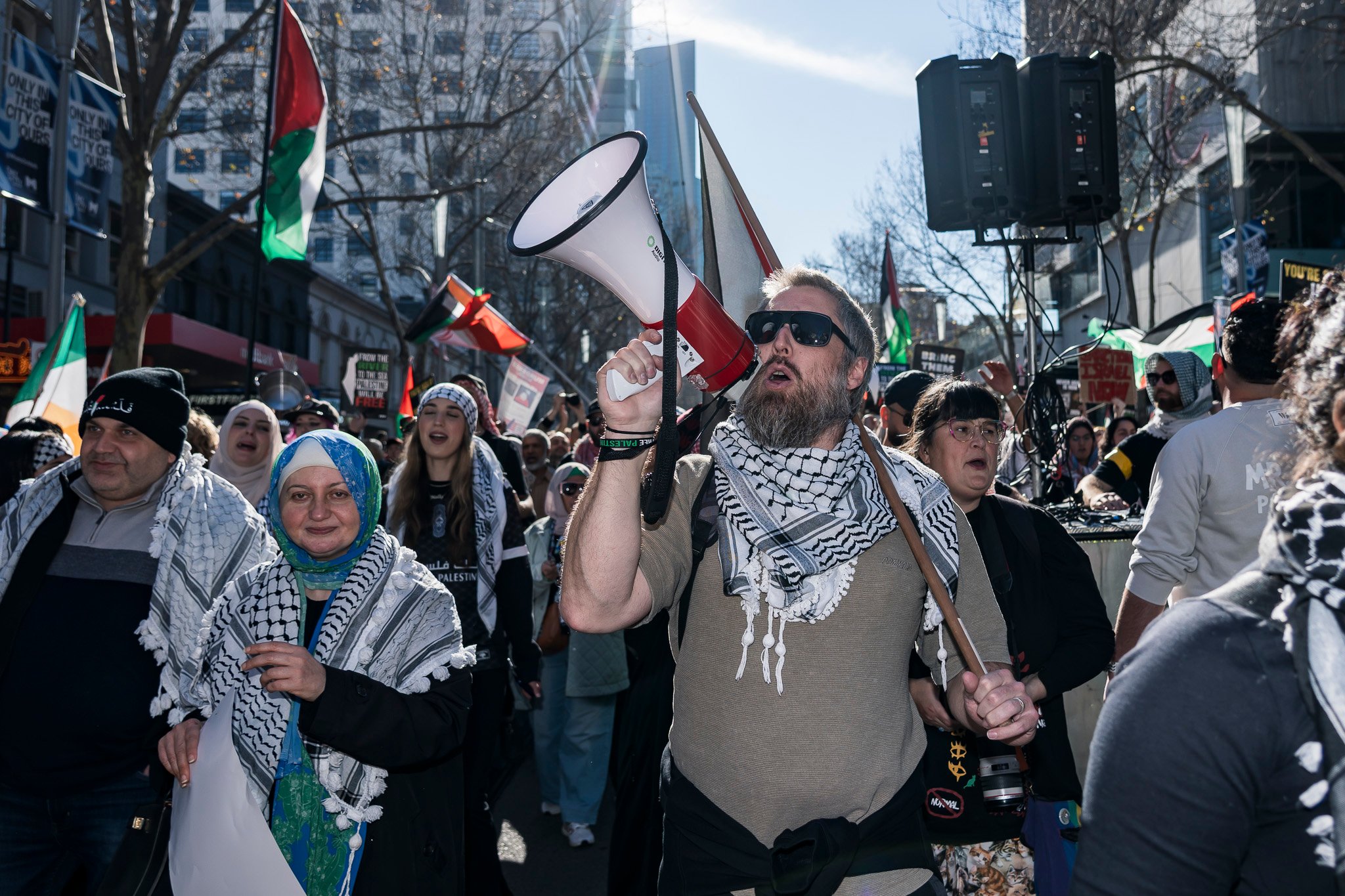 The march begins, moving down Swanston St.