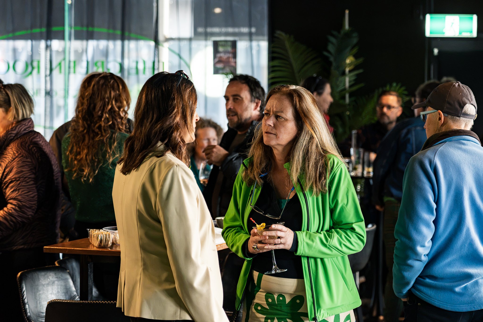 Senator Steph Hodgins-May engaging with Greens supporters.