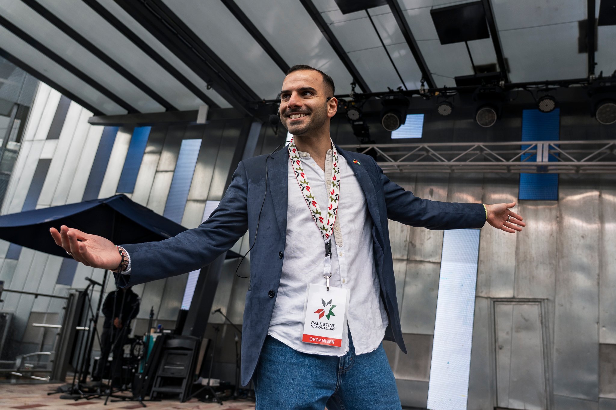 Amin Abbas revving up the crowd at Palestine National Day 2025.
