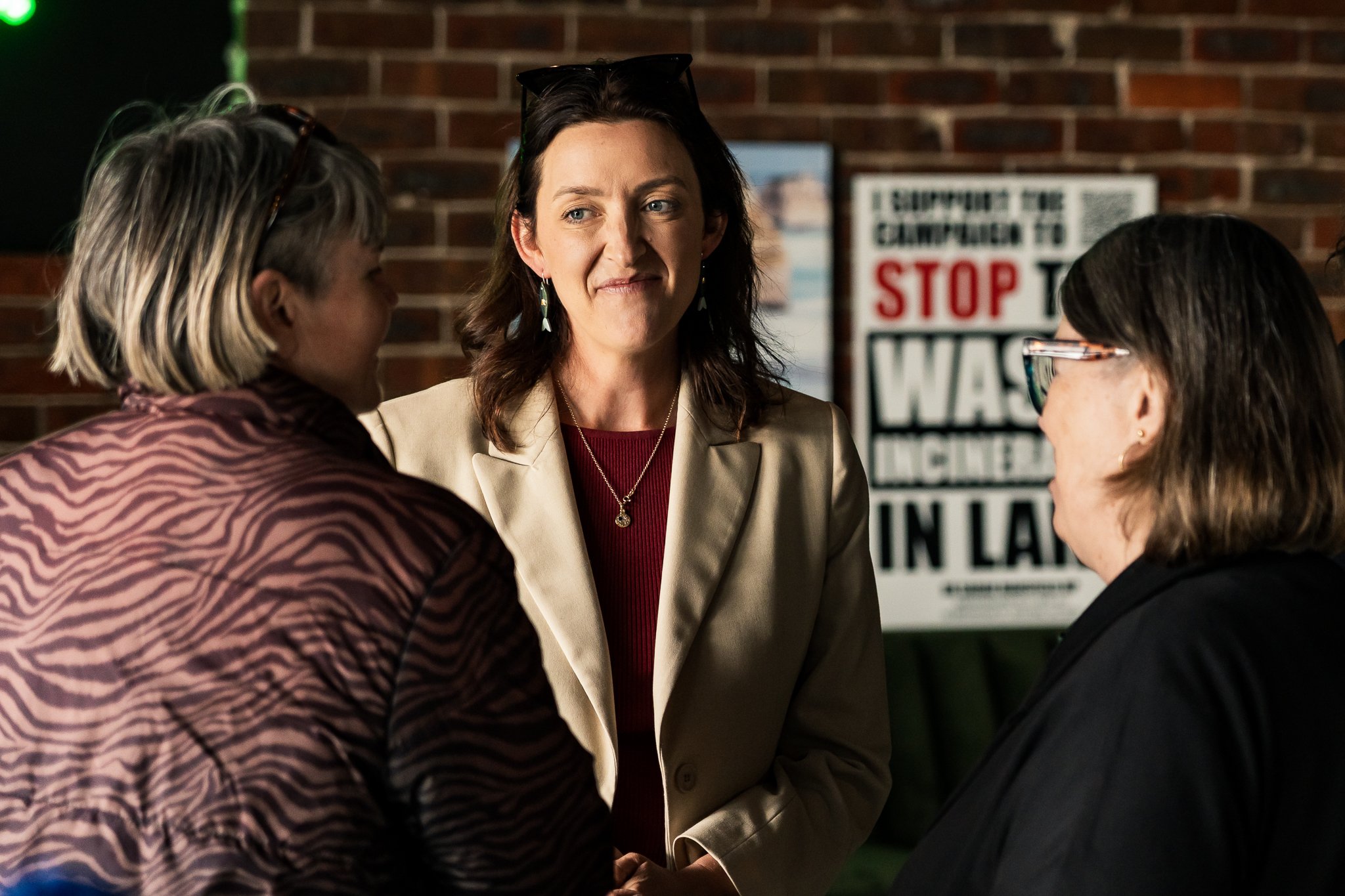 Senator Steph Hodgins-May engaging with Greens supporters.