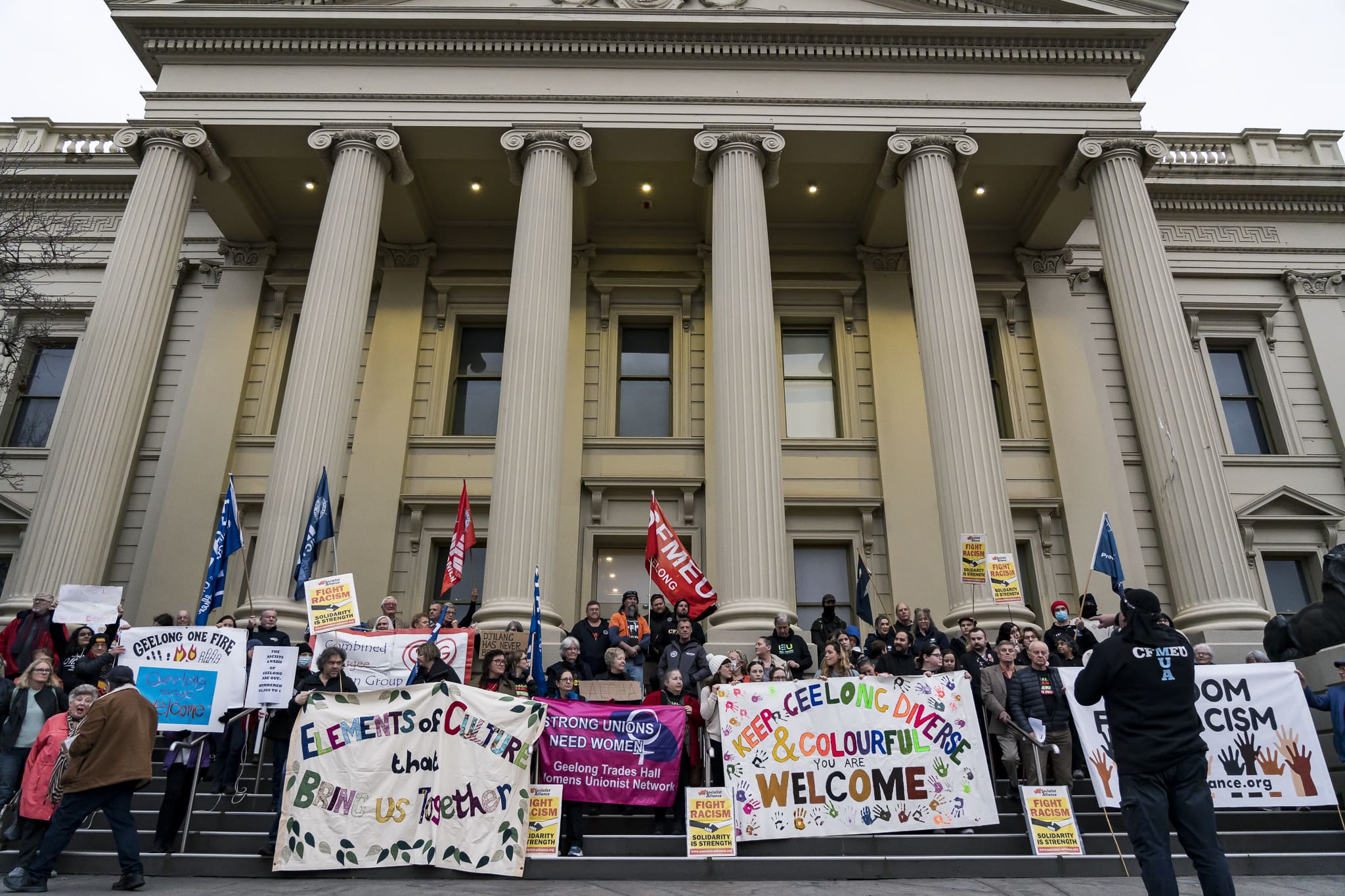 Members of the Geelong community rally on the steps of Geelong City Hall to oppose racism and far-right extremism. Photo: Matt Hrkac