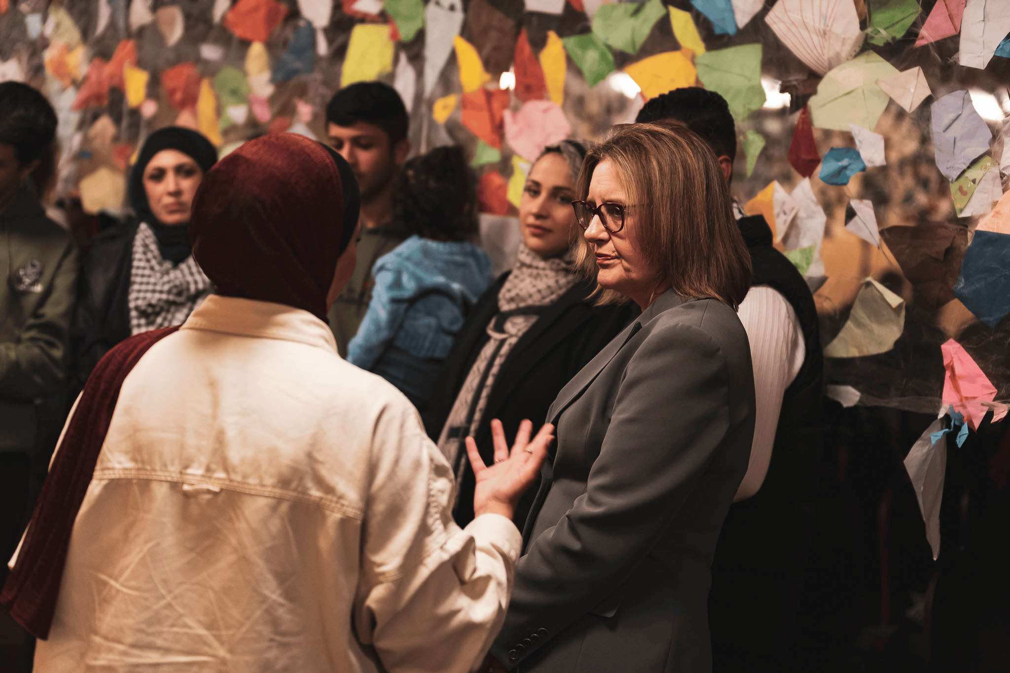 Victorian Premier Jacinta Allan engages with attendees at the vigil.