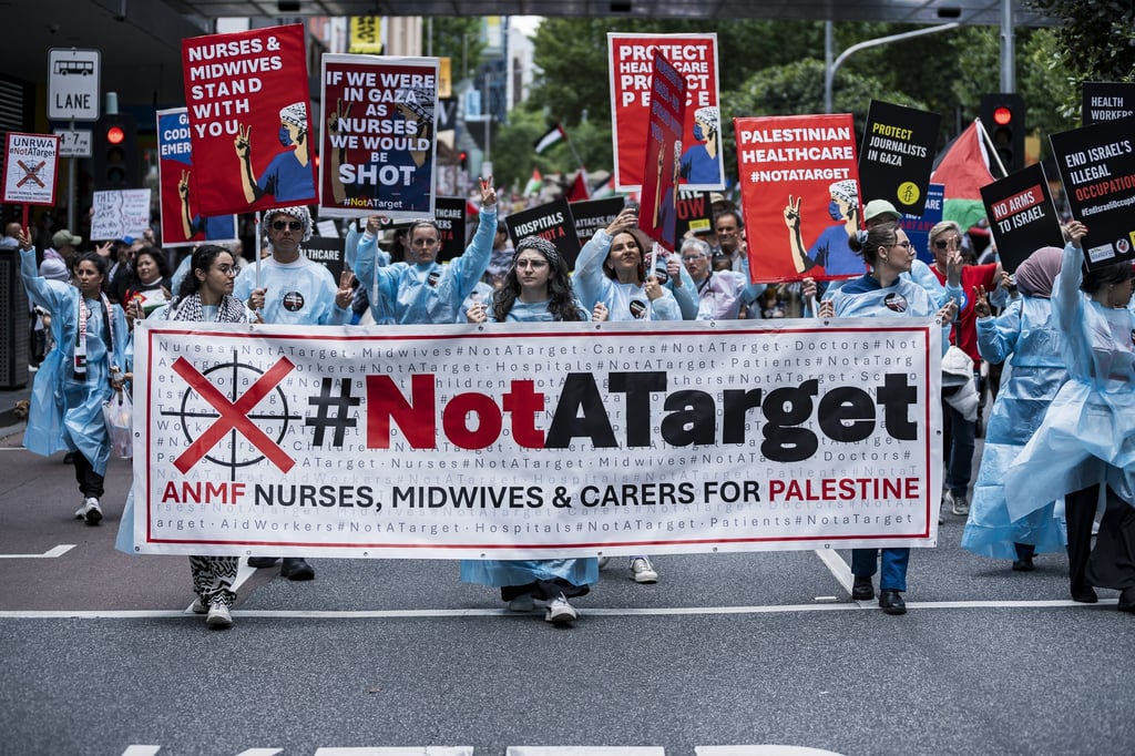 Photos: Healthcare Workers for Palestine contingent at weekly Palestine rally Photos: Healthcare Workers for Palestine contingent at weekly Palestine rally