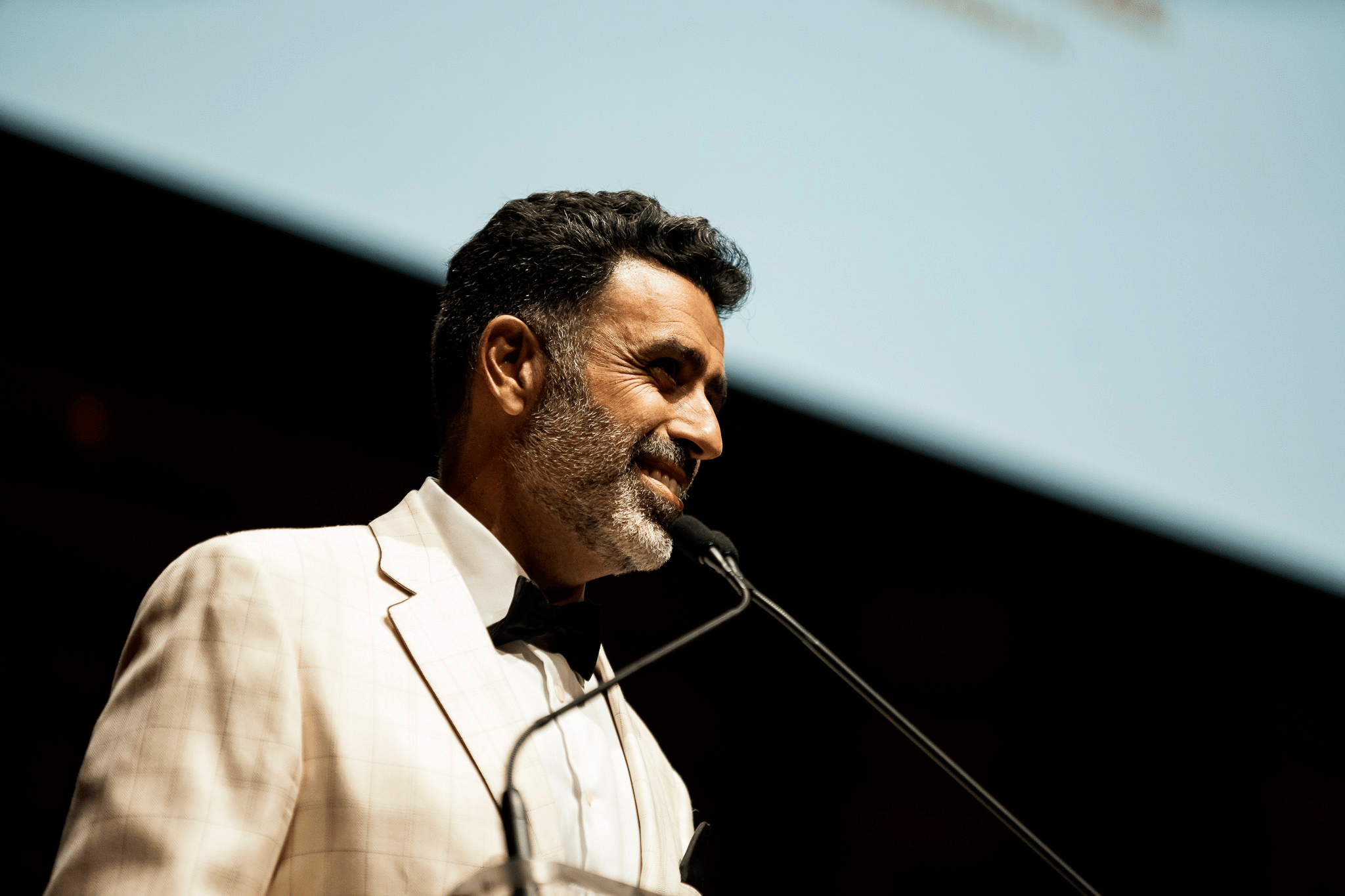 Nasser Mashni addressing attendees at the 2025 Al Quds Peace Prize.