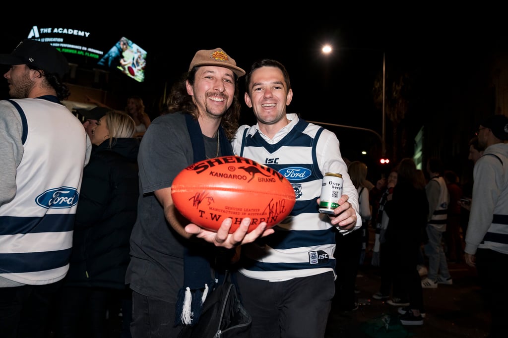 Geelong Cats supporters celebrate 2022 Grand Final win. Geelong Cats supporters celebrate 2022 Grand Final win.