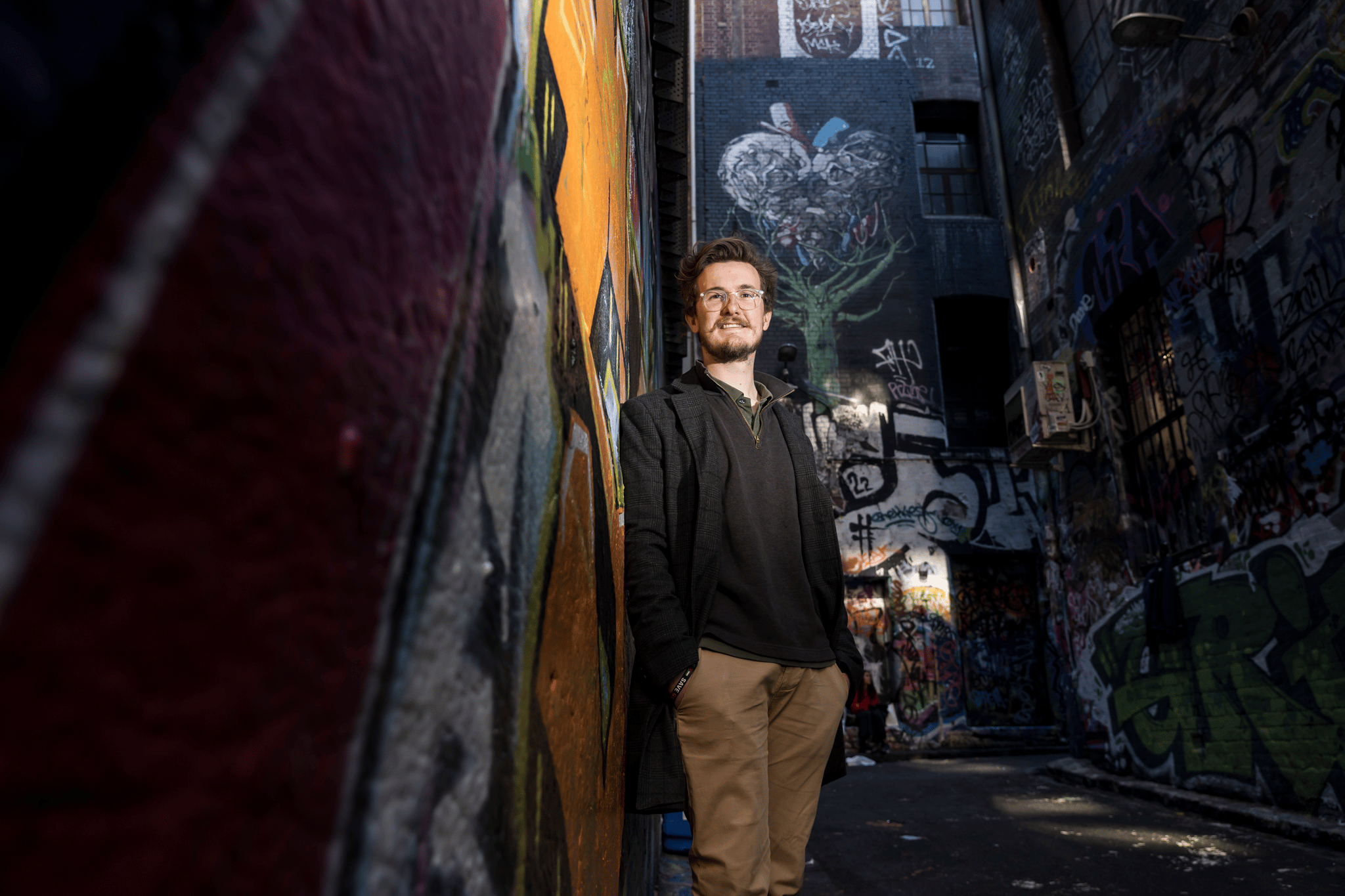 Jordan van den Lamb photographed standing in Hosier Lane.