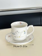 ⁦كوب قهوة سيراميك بتصميم بطة أنيق مع صحن⁩ - الصورة ⁦2⁩