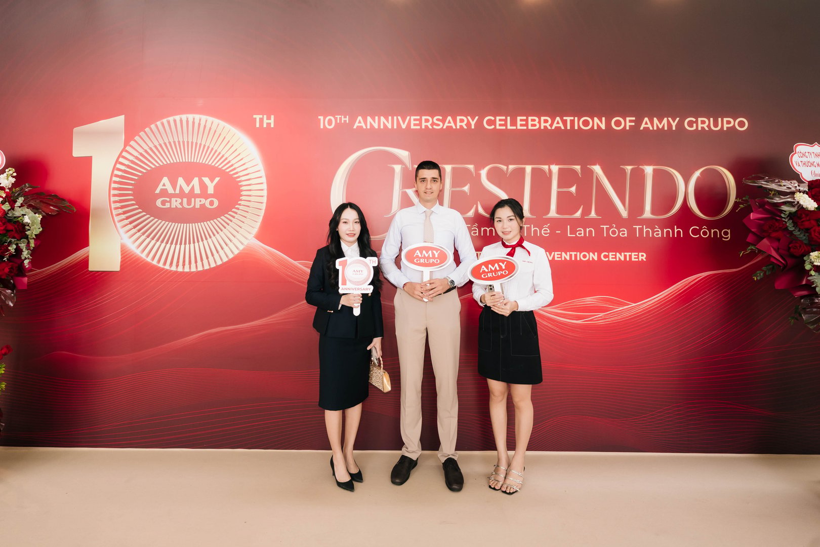 Nick Popović with AMY GRUPO team members at the company’s 10-year anniversary