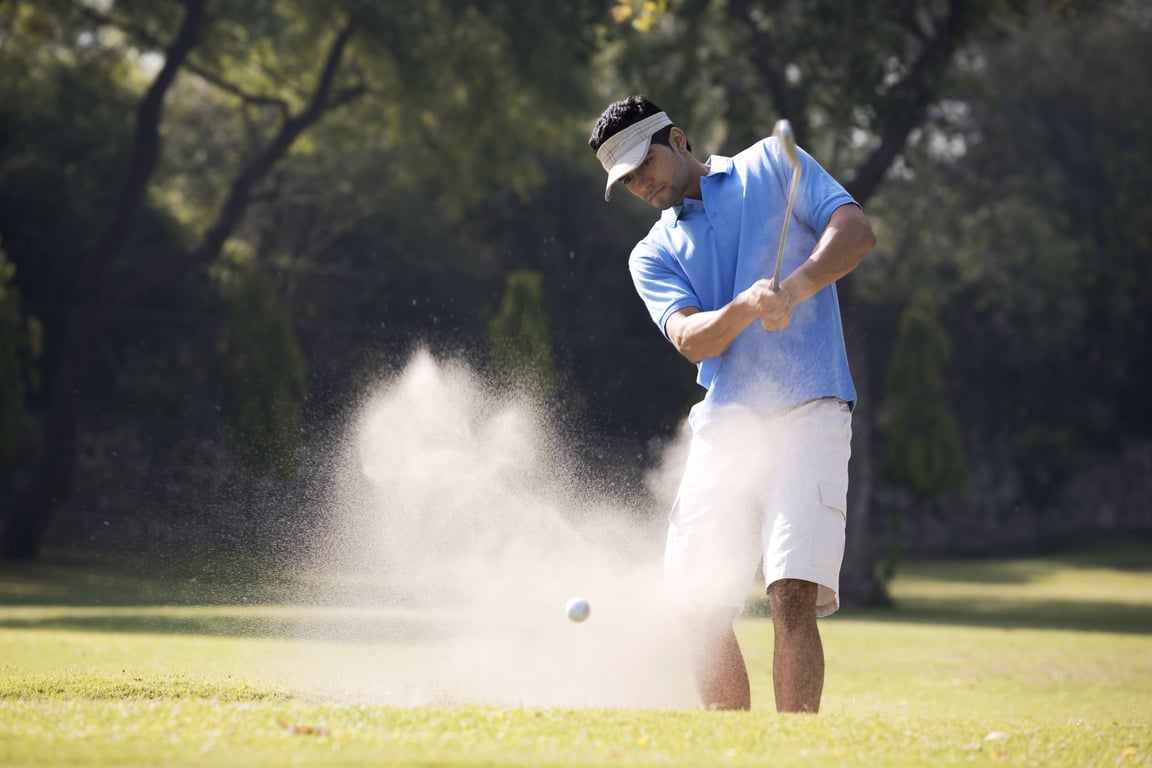 Person playing golf