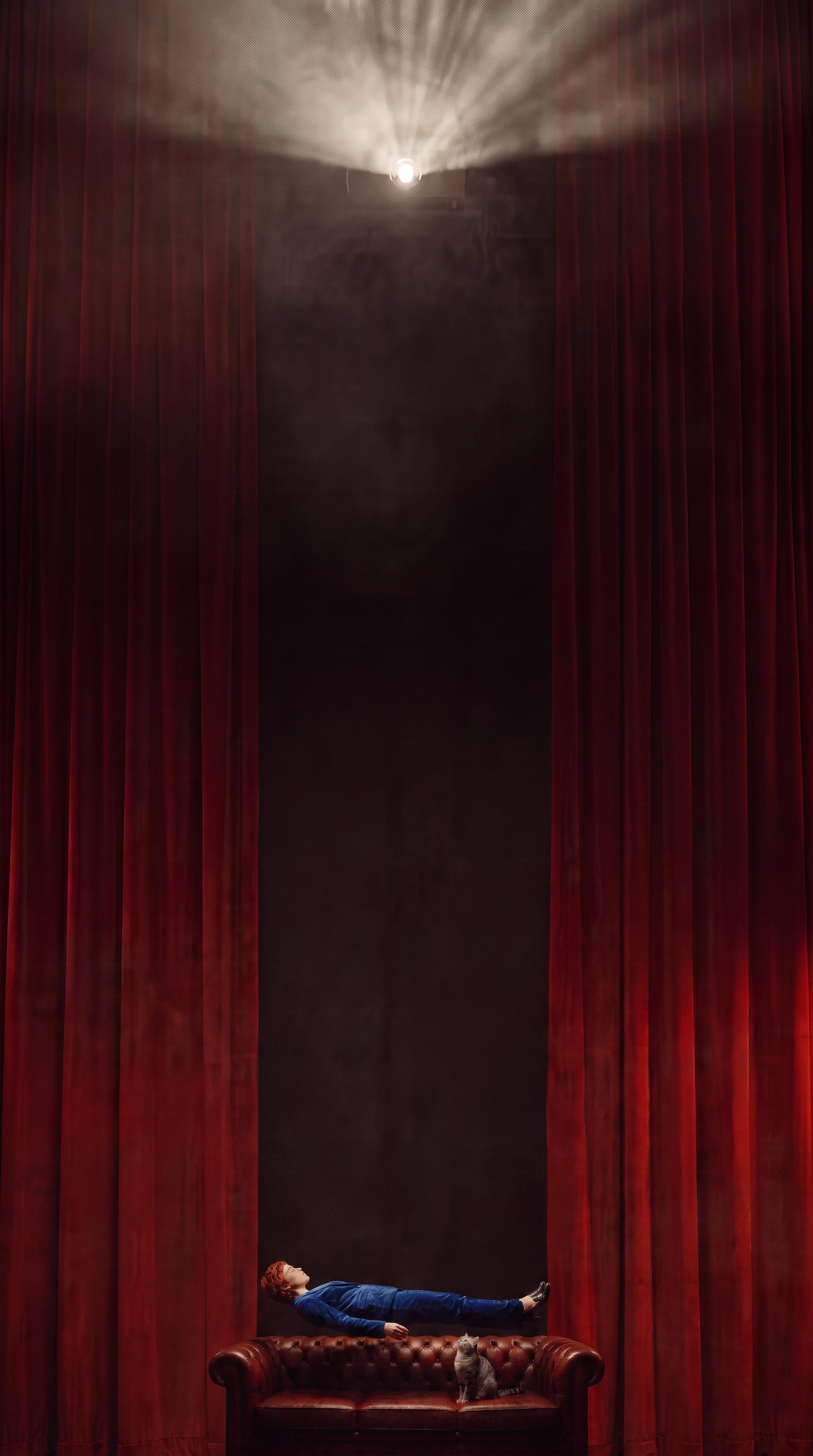 AI-recomposed portrait: the screening room extends upward to reveal tall curtains and a projector beam