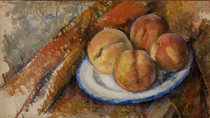 Four Peaches on a Plate