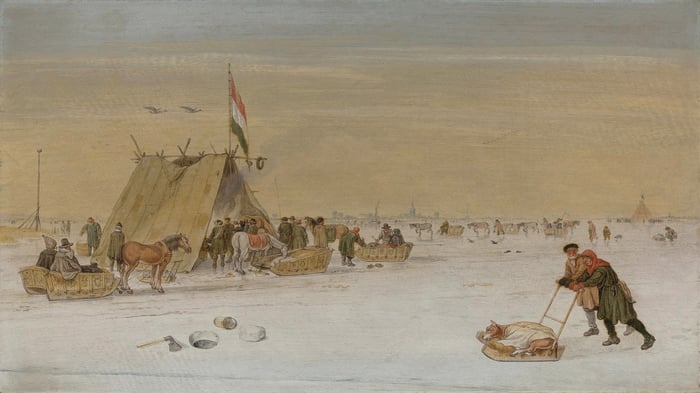 A winter landscape with figures on the ice