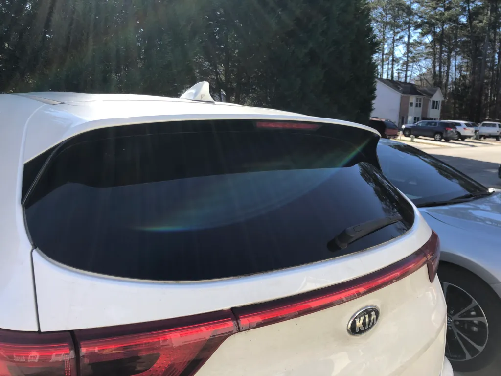 KIA rear window with professional ceramic tint installation