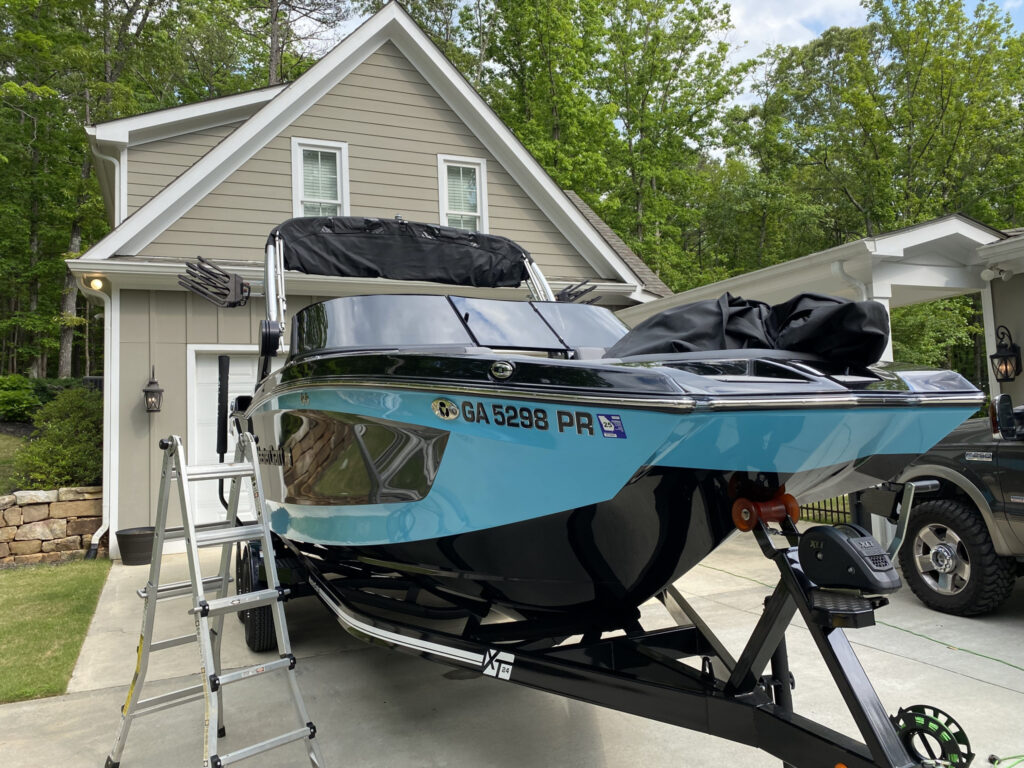 Marine boat window tinting - professional installation on boat trailer