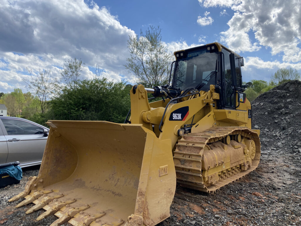Caterpillar heavy equipment with professional cab window tinting - mobile service Atlanta