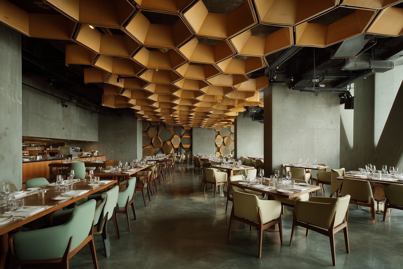Modern restaurant interior with honeycomb wood ceiling, concrete walls, and simple table settings.