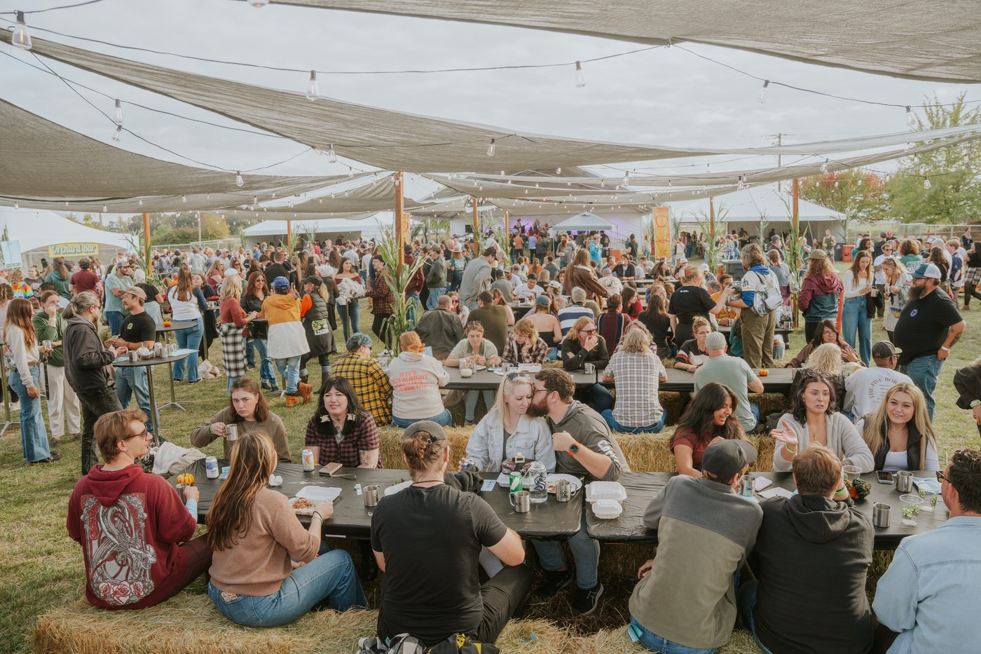 A lively crowd enjoying the 2 Towns Ciderhouse Harvest Party 2025.