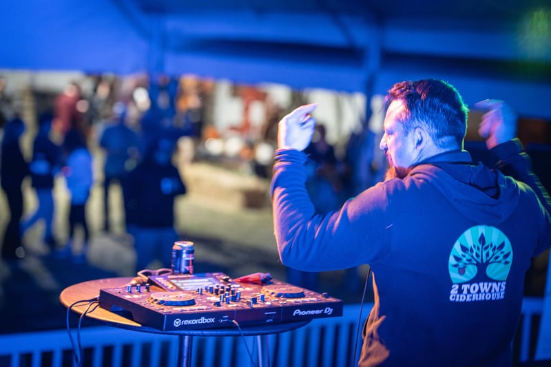 A DJ performing at Harvest Party 2024.