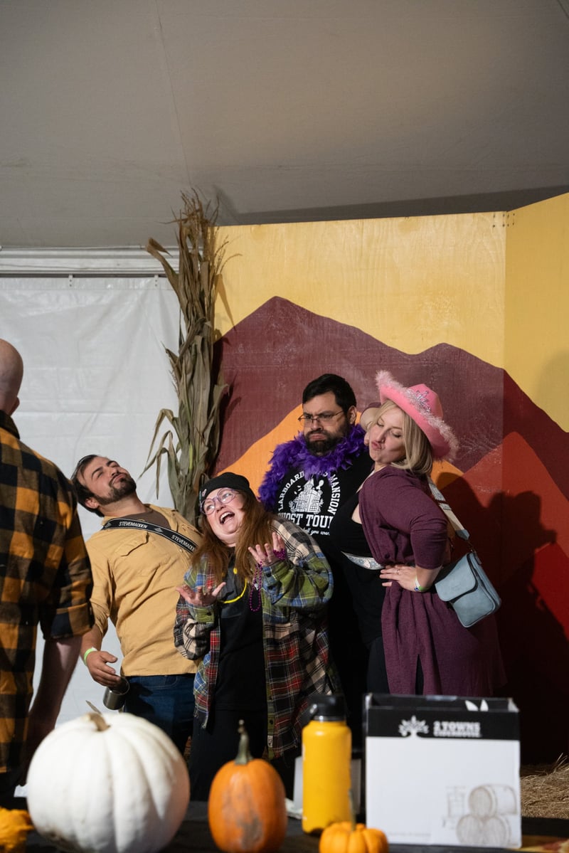 Guests enjoying the photo booth at Harvest Party 2024.