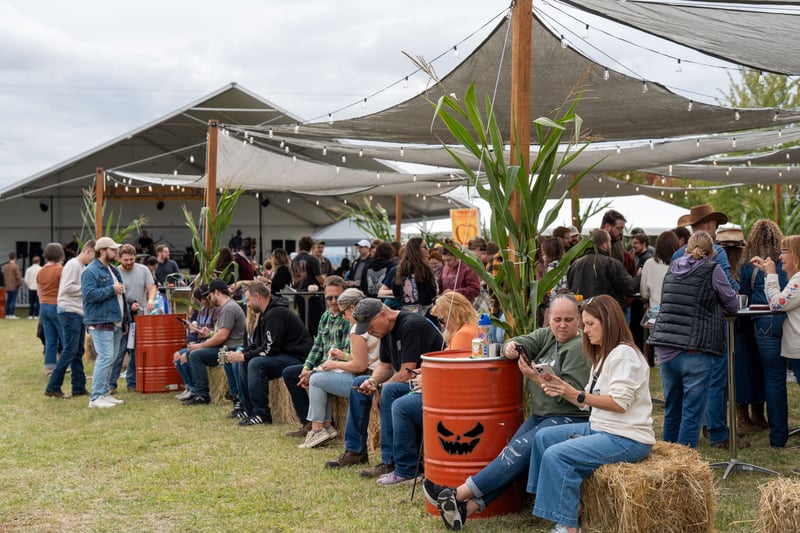 A lively crowd enjoying the 2 Towns Ciderhouse Harvest Party 2025.