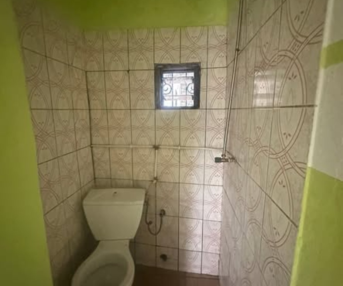 Chambre moderne avec coin cuisine à Logbessou