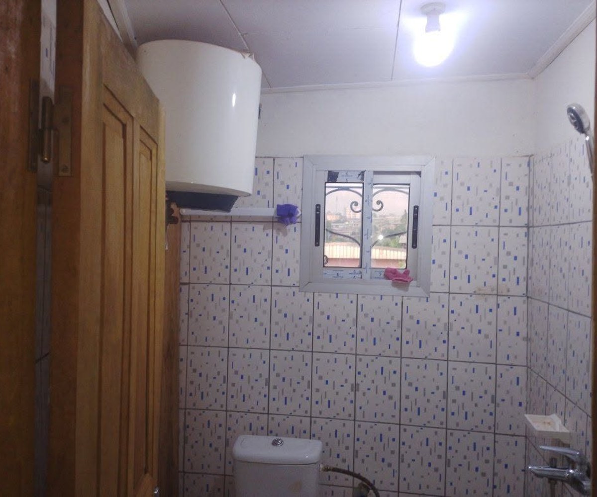Chambre moderne à Mimboman Château
