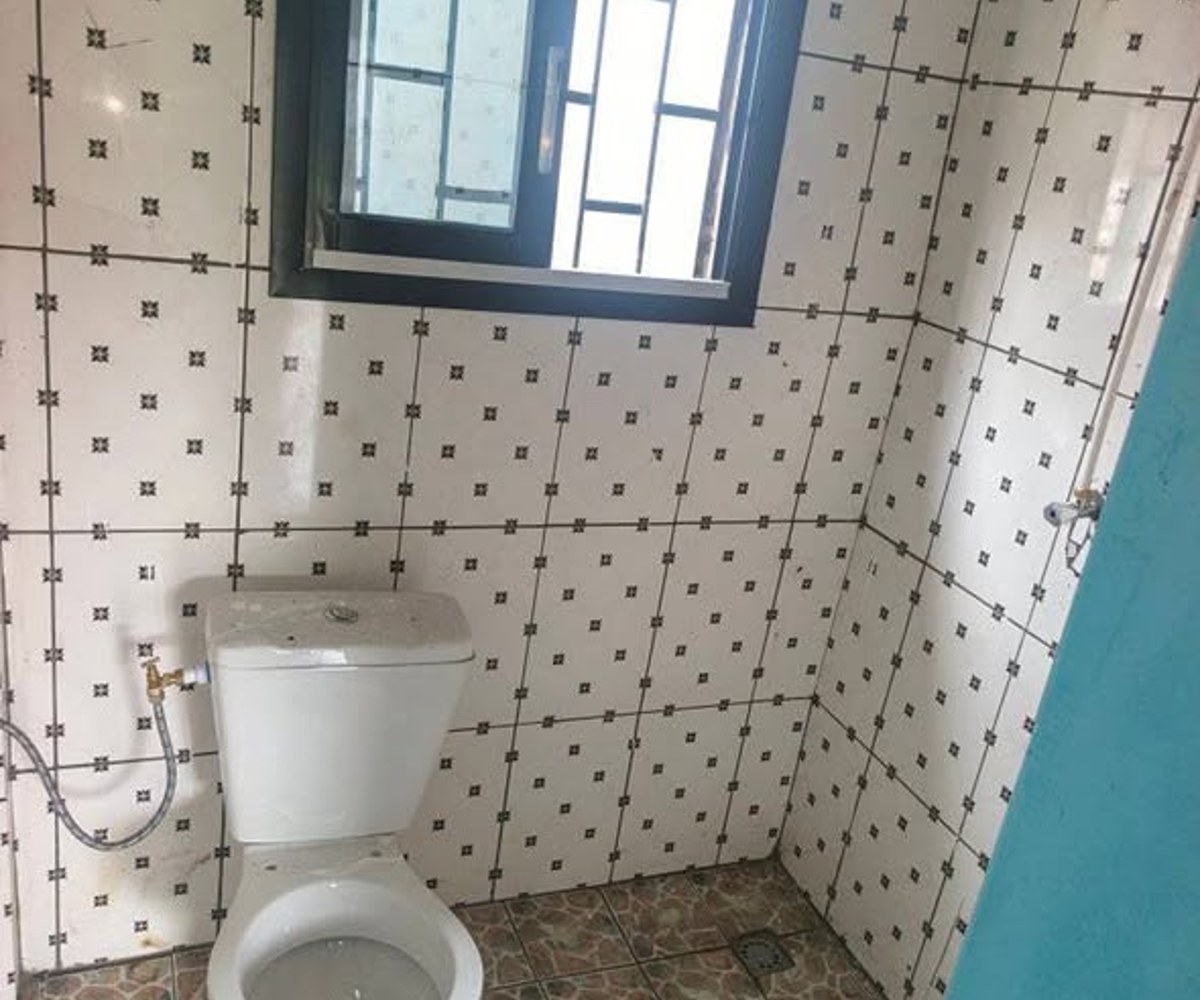 Chambre moderne avec cuisine à Logbaba
