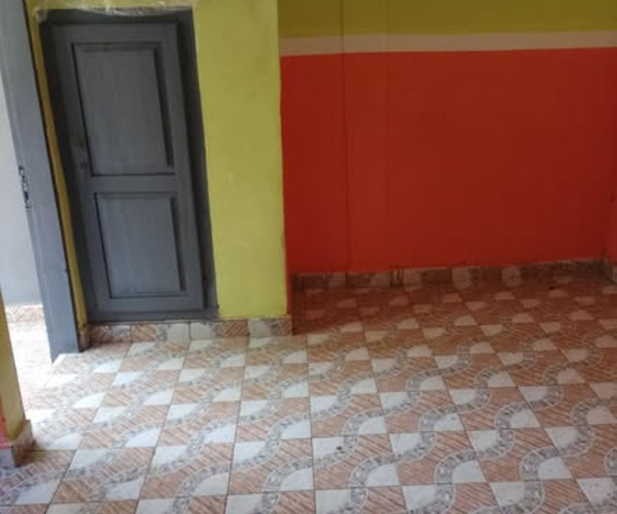 Grande chambre moderne à Ngousso