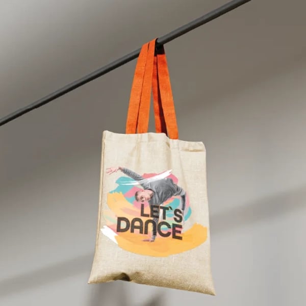 Flex Series Poster Printer Cutter printing colorful designs on tote bags