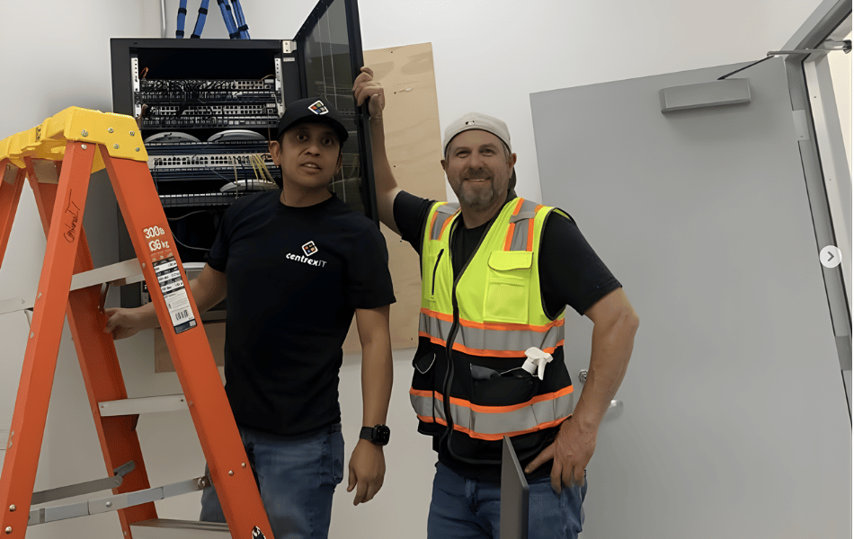 centrexIT leadership team working on client cabling project