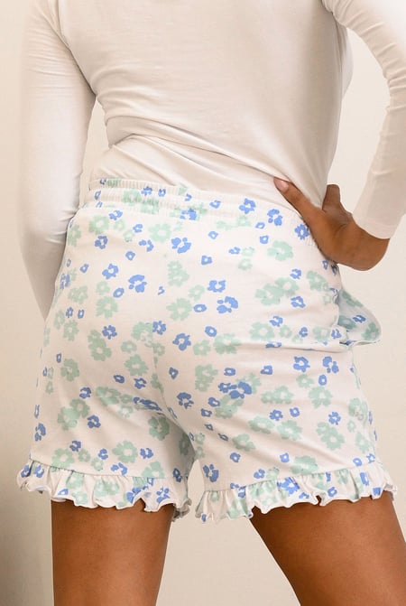 Womens White Ruffle Hem Printed Shorts