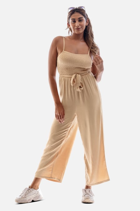 Cream Belted Solid Jumpsuit with a Shirred Silhouette
