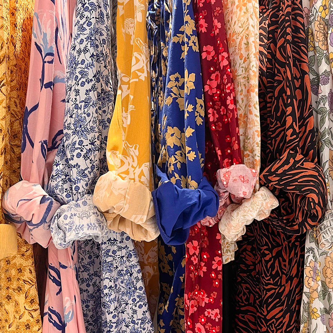 Lightweight and breathable summer fabrics including cotton and linen textures