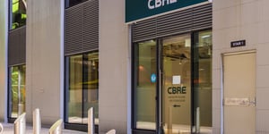 The Real Estate Titans: How Savills and CBRE Group Are Shaping the Future of Property Management
