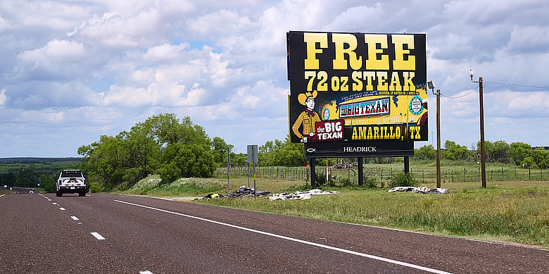 roadside billboard for The Big Texan