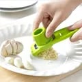 Compact and Durable Mini Garlic Grinder - Manual Kitchen Tool for Efficient Garlic Grinding, Crushing Ginger, Herbs, and Nuts - Portable and Easy to Clean Garlic Press for Home Cooks and Campers - High-Quality Construction for Long-Lasting Use