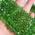 Wholesale Crystal Glass Beads Set - High-Quality Faceted Rondelle Spacer Beads for DIY Jewelry Making Projects - Clear Green Color - Sizes 4mm to 12mm - Sparkling Effect - Bulk Pack for Retailers and Jewelry Makers - Elegant and Versatile Design