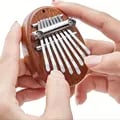 Exquisite 8 Key Mini Wooden Kalimba Thumb Piano - High-Quality Construction, Portable Marimba Musical Accessory - Perfect Gift for Music Lovers and Beginners, Clear and Melodious Tones, Easy to Play with Thumbs and Fingers, Compact and Versatile Design