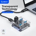 ORICO Transparent USB C Hub with High-Speed USB 3.2 Protocol, 4 Port Expansion, Power Supply Interface, OTG Adapter, and Transparent Design for Quick Data Transmission and Multi-Device Connectivity