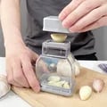Efficient Manual Garlic Pressing Tool with Grater and Cutter - Easy to Use, Clean, and Store - Durable Construction for Long-Lasting Performance - Versatile Kitchen Accessory for Fast Meal Preparation and Space-Saving Storage
