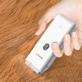 Professional Cordless Dog Clipper with Rechargeable Battery and Precision Cutting - Ideal for Cats, Puppies, and Dogs of All Sizes - Low Noise Operation for Stress-Free Grooming - Safe and User-Friendly Design with Easy Maintenance - Includes Adjustable Blade Lengths and Ergonomic Grip