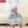 Modern Mummy Diaper Bag with Spacious Interior, Waterproof Material, Crossbody Design, and Essential Features for Busy Moms - Stylish and Versatile Travel Companion for Baby Essentials Organization and On-the-Go Convenience