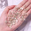 50-Piece Luxury Nail Art Charms Set with Heart and Bowknot Designs - Mixed Style 3D Nail Art Dangles with Tassel Design Alloy Material - Easy to Apply Versatile Nail Art Decorations for Glamorous Manicures and Unique Designs