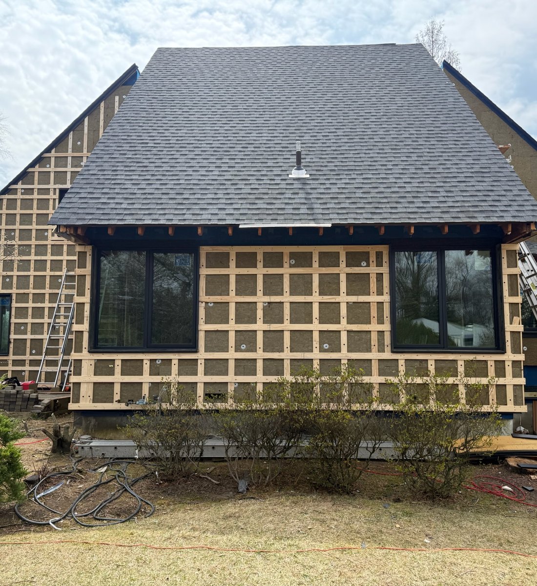 Construction site with cranes and building materials