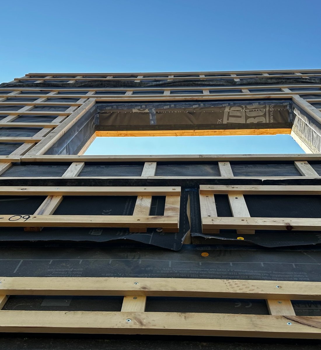 Construction site with cranes and building materials