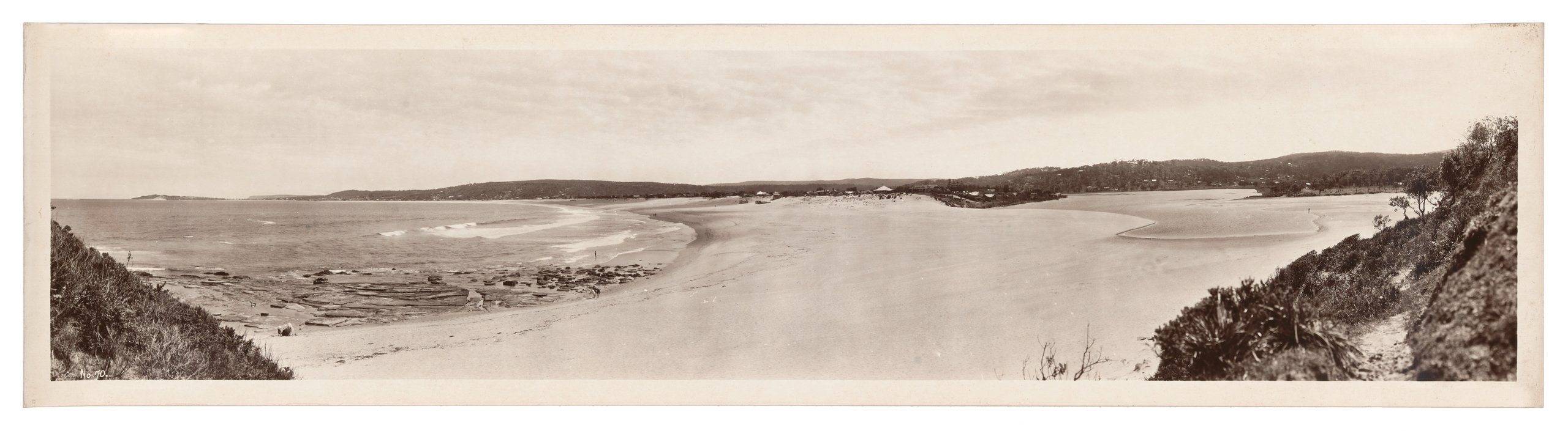 Panoramic photograph of Narabeen beach and lake published by Alan Row & Company