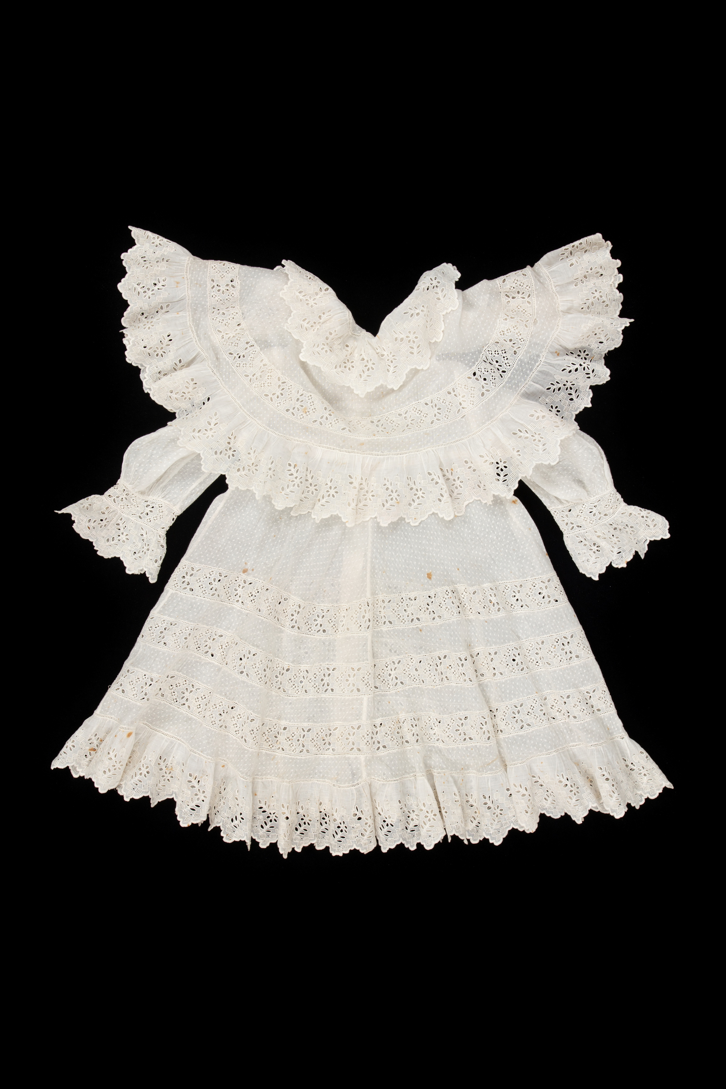 Childs dress with double cape