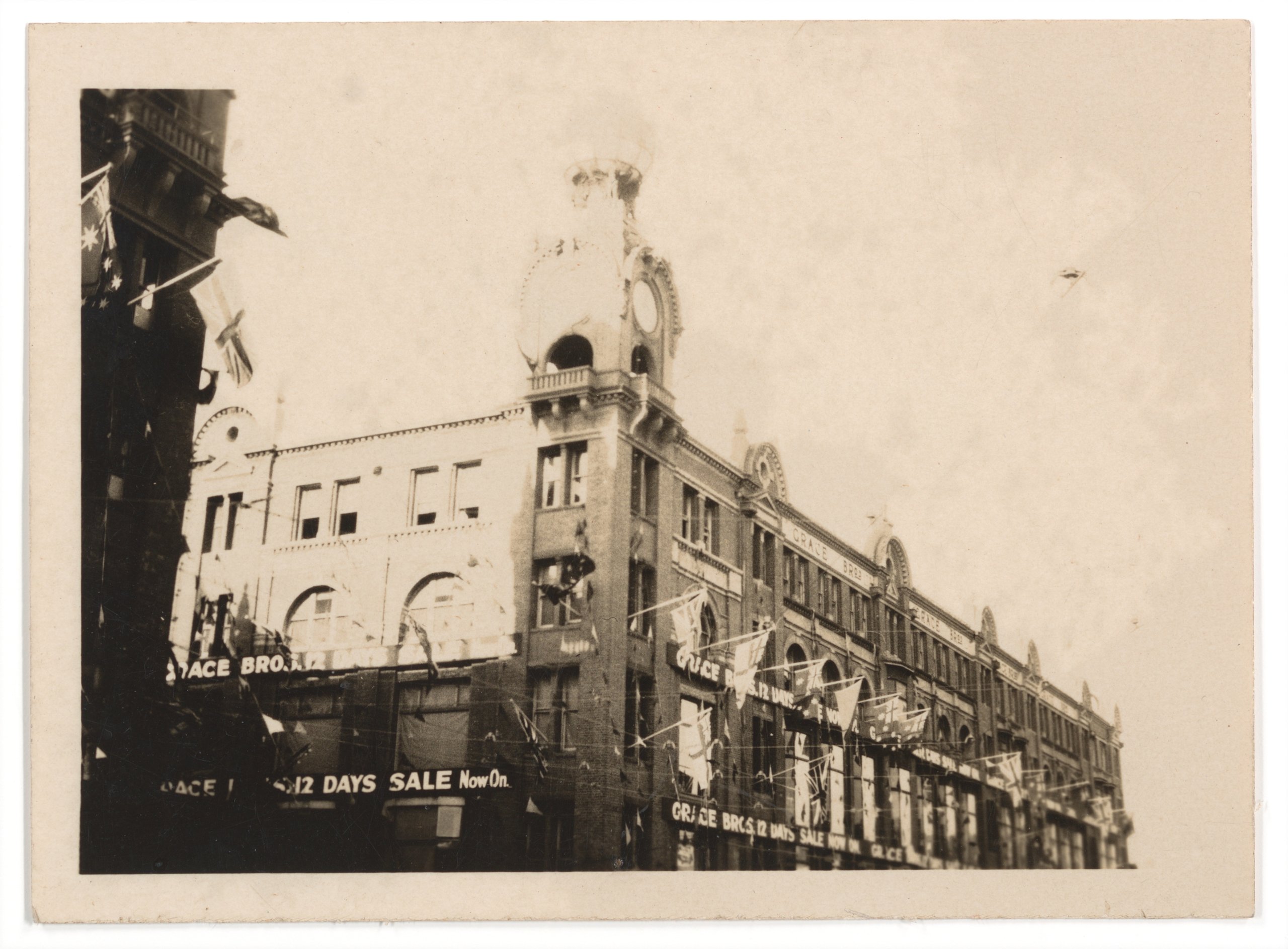 Photograph of advertising signs for Grace Bros 12 Days Sale