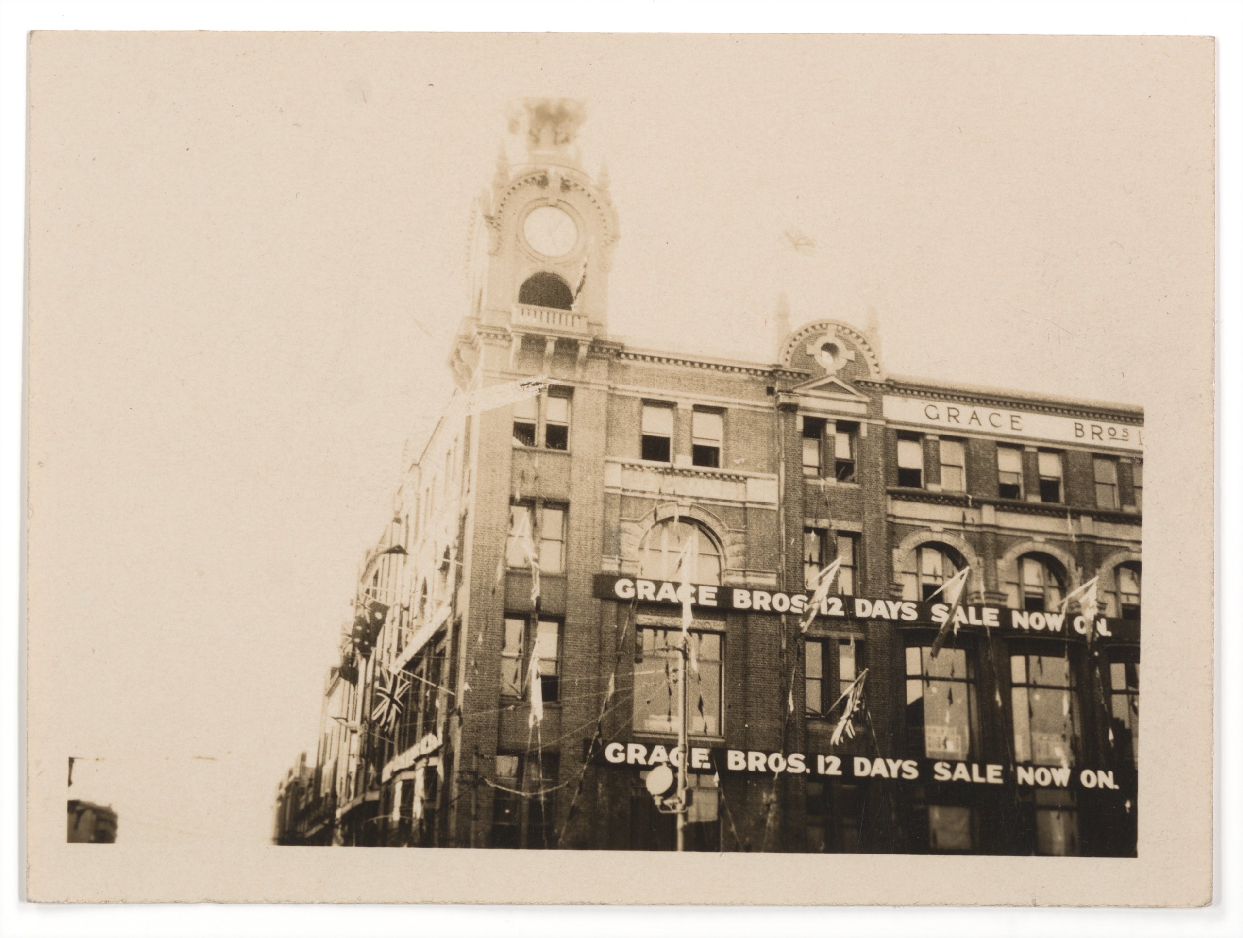 Photograph of advertising signs for Grace Bros 12 Days Sale